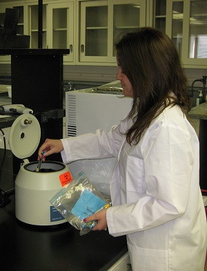 EARLI lab worker wearing a white lab coat