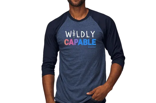 A model wearing Autism Speaks 'Wildly Capable' t-shirt