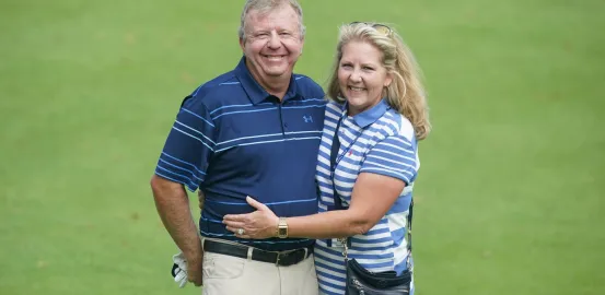 Billy and Tami Mayfair on a gold course. Credit Bill Greenblatt