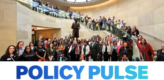 advocates standing on stairs with "policy pulse" written at the bottom