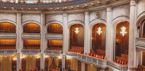The inside of a large building with a dome
