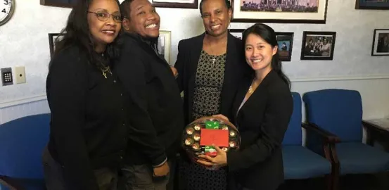Monica Watts and her son with Judy Chu andand Robin Hollis