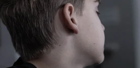 side of a young boys head