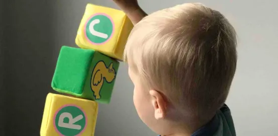toddler playing with blocks