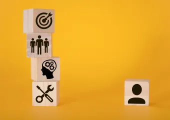 blocks stacked showing research and progress
