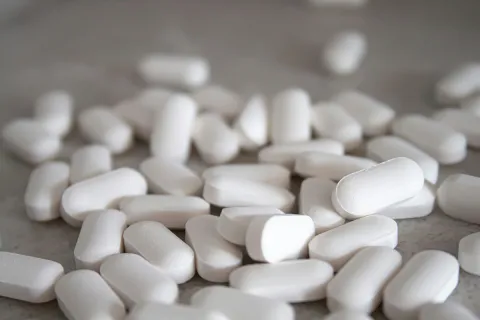 Acetaminophen pills on a countertop