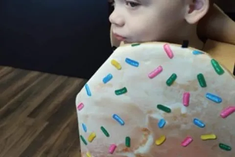 Autistic boy in Halloween costume