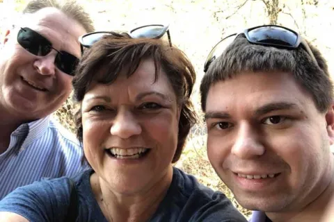 Dan with his parents, Emily and Michael 