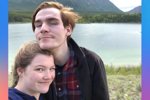 Molly and Brendan in front of a lake
