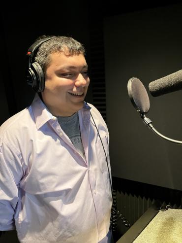 Christopher in the studio narrating an Autism Speaks promotional video