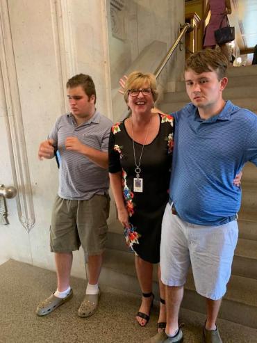 Rep. Abercrombie with self-advocates Ben Boore and Jeremy Shea