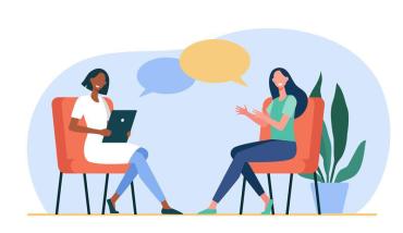 Happy women sitting and talking to each other