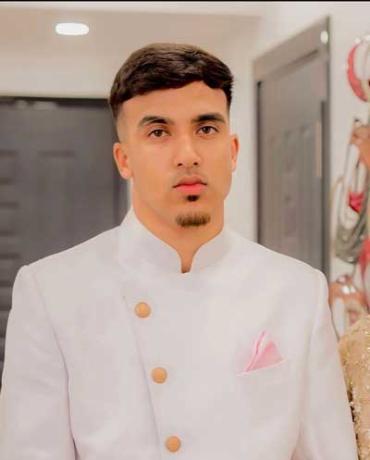 Haris wearing a chef jacket