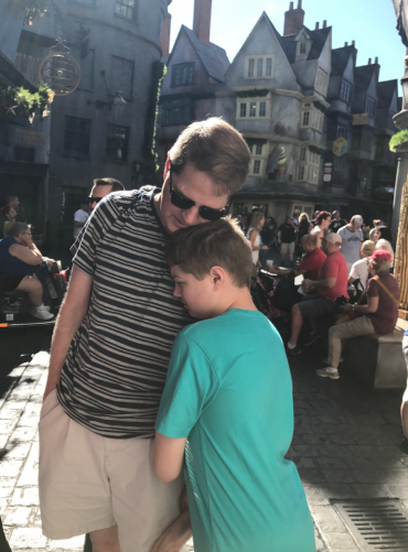 Jeff McCafferty and his son at an amusement park