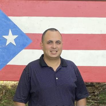 Josean Santos with Puerto Rico's flag. 