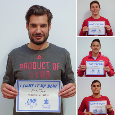 New York Red Bulls players holding signs about why they Light It Up Blue for World Autism Month
