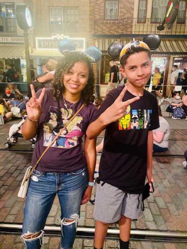Noah and Maurissa at Disney wearing Mickey ears