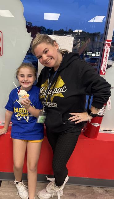 Scarlett and her mom eating ice cream after cheerleading practice
