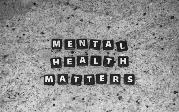 Scrabble letters spelling out the words 'mental health matters'