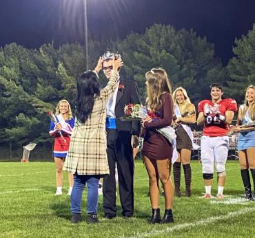 Autistic high school senior crowned homecoming king by fellow students 