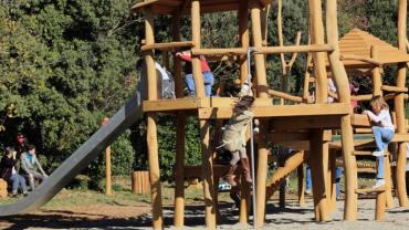 young children on a wooden playground
