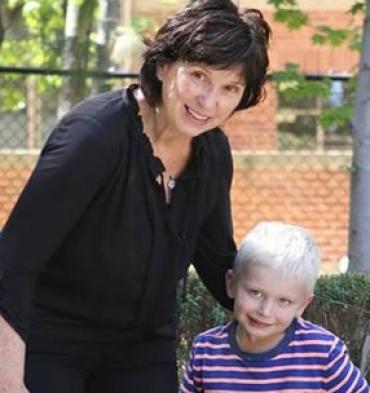 psychologist Connie Kasari with a blonde boy