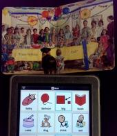 AAC device used to help while reading a book