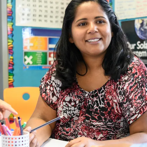 Smiling female educator
